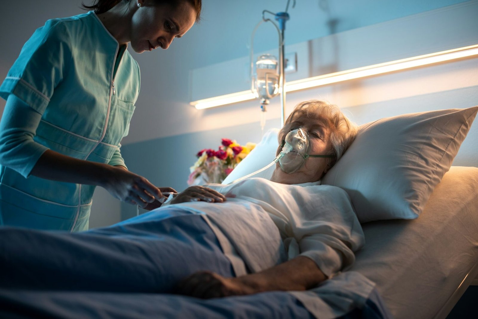 Nurse checking a senior patient at the hospital